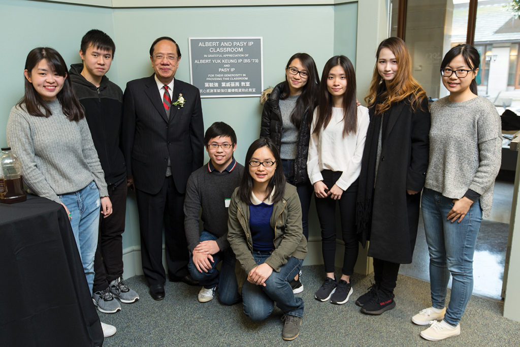 Albert Ip, (third from left) BSAMCS ’73, at the dedication ceremony for the Albert and Pasy Ip Classroom in the Olin School’s Simon Hall in March 2017.