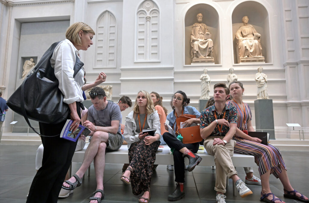 Students attend their art history class at the The Museo dell'Opera del Duomo in Florence, Italy.