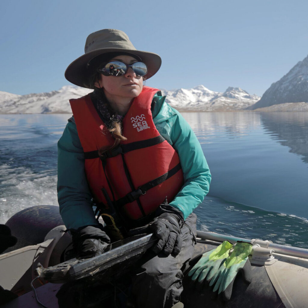 Sarah Baitzel, an archeologist, travels on a boat to a high altitude lake in the Peruvian Andes